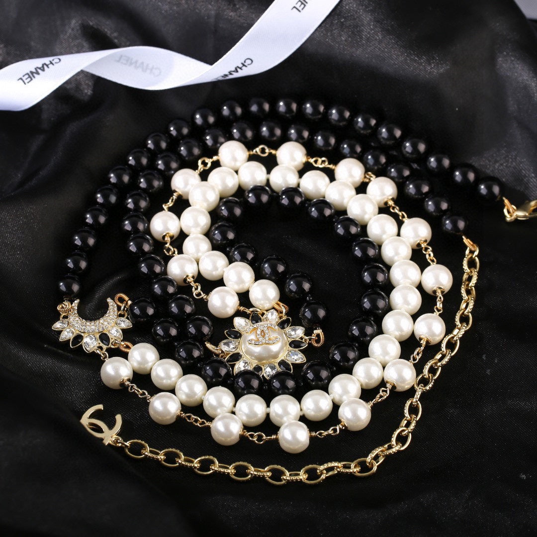 CHANEL 25S CHAIN BELT IN WHITE AND BLACK PEARL 614477