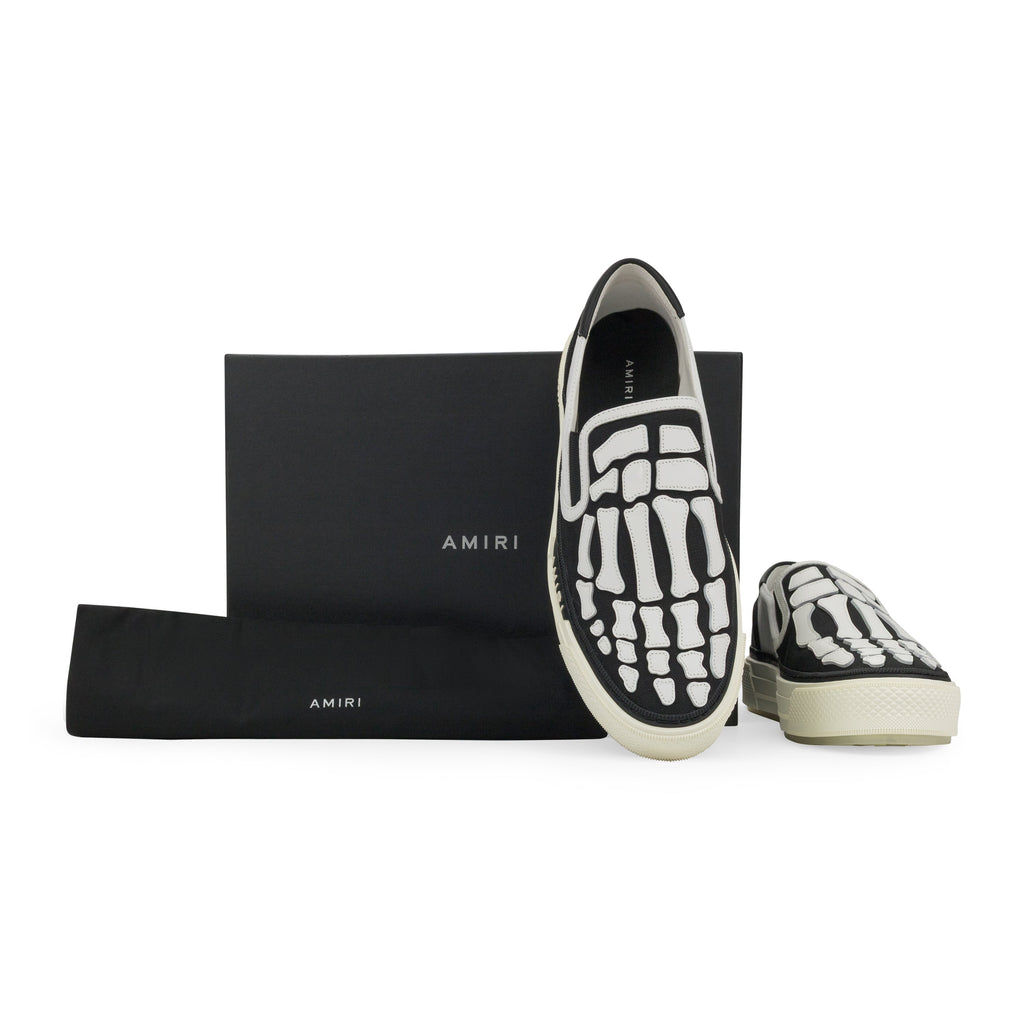 White/Black Skel Top Slip On Sneakers