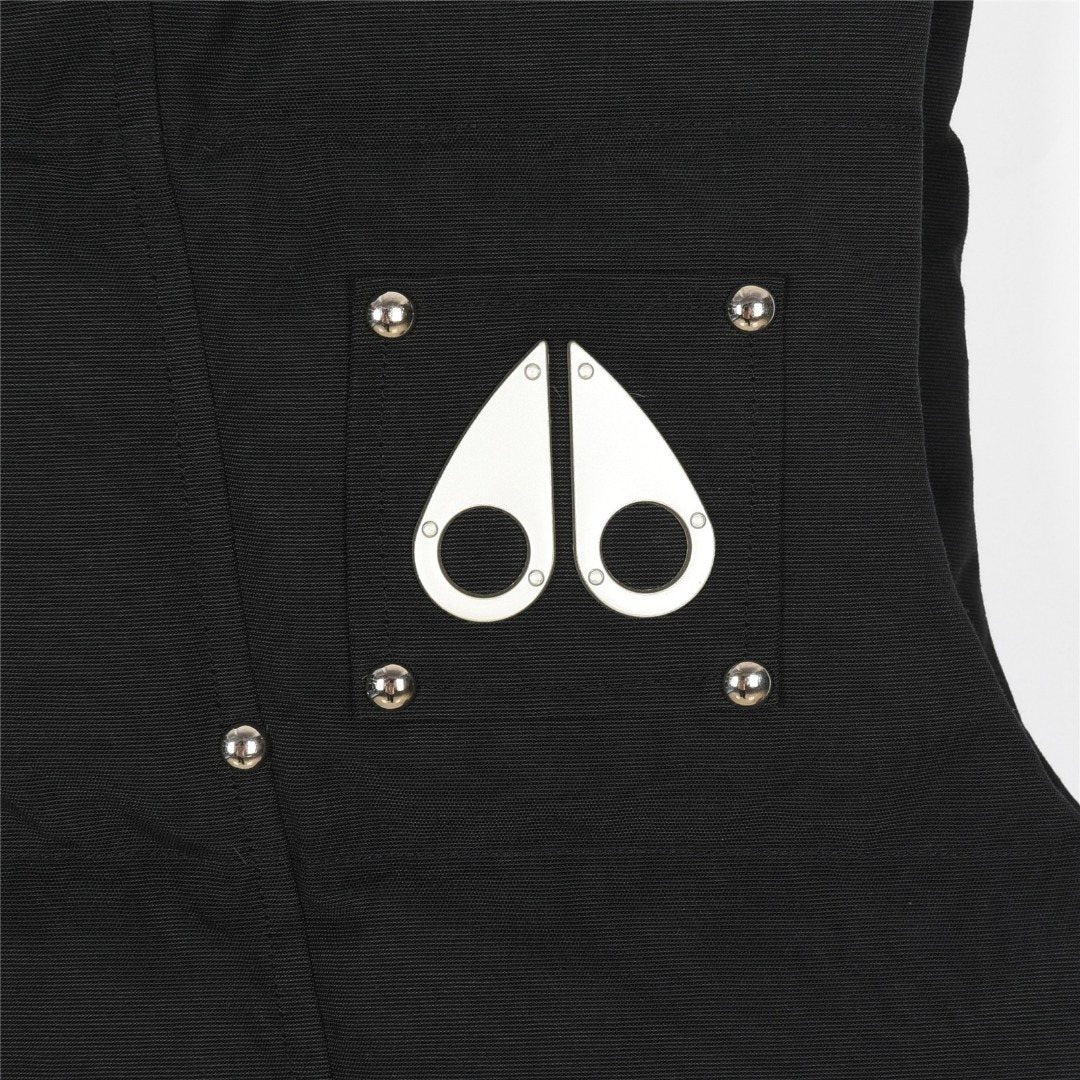 Moose Knuckles Puffer Vest in Black with Metallic Logo and Stud Details