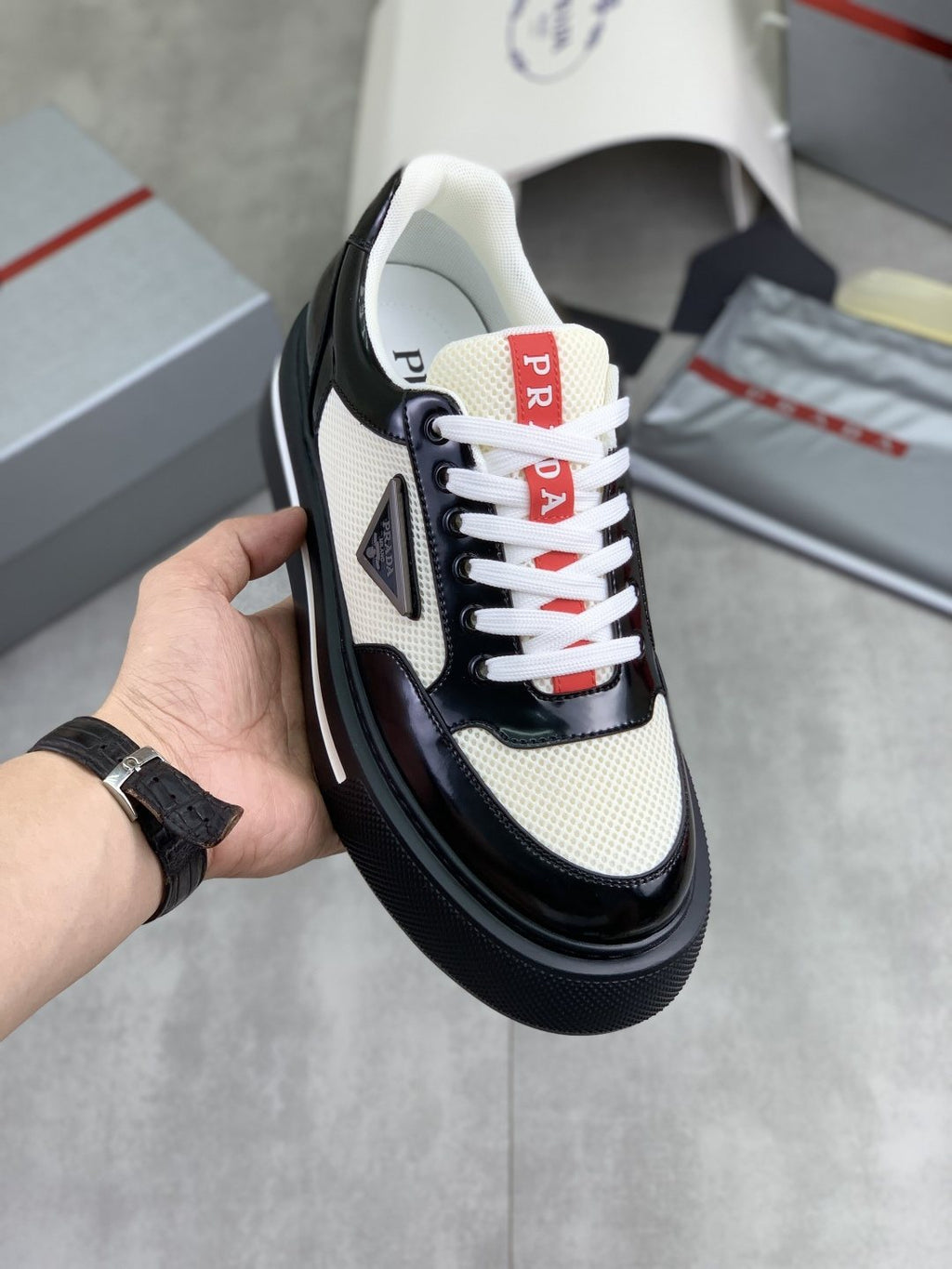 Prada Triangle Patch Low-Top Sneakers